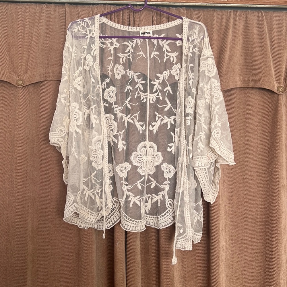 Floral mesh throw over